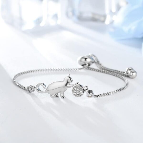 stunning silver crystal cat and ball charm bracelet