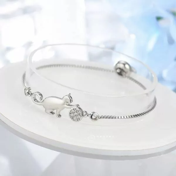 unique silver crystal cat and ball bracelet: the perfect accessory for any occasion