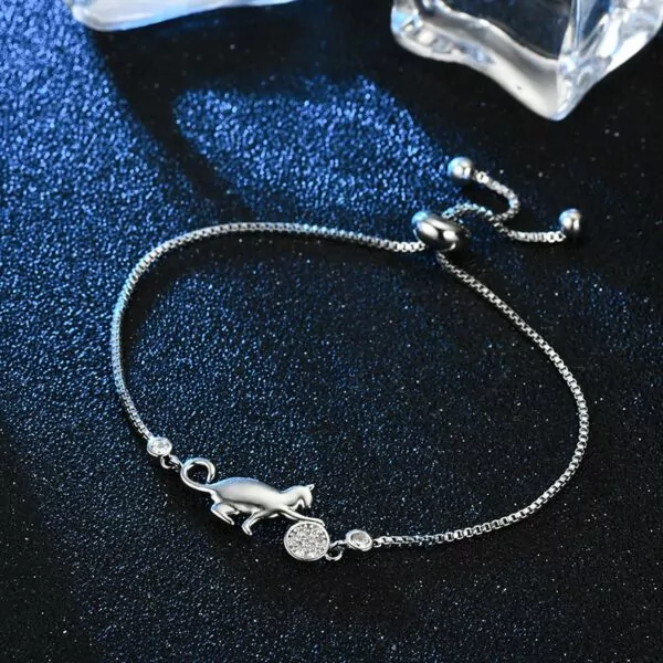 unique silver crystal cat and ball bracelet: the perfect accessory for any occasion